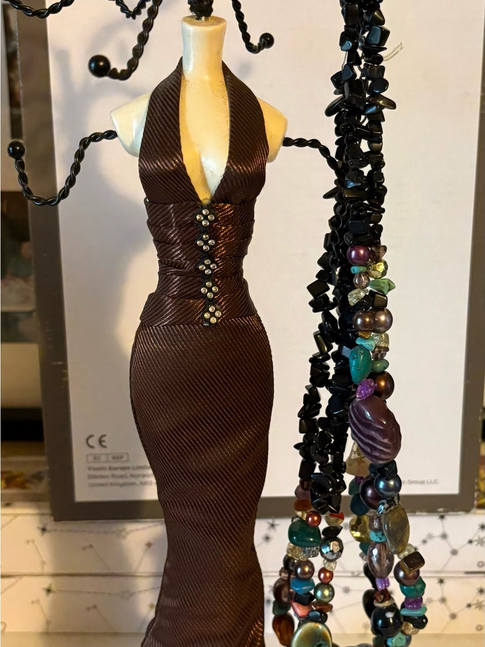 Three costume jewelry necklaces